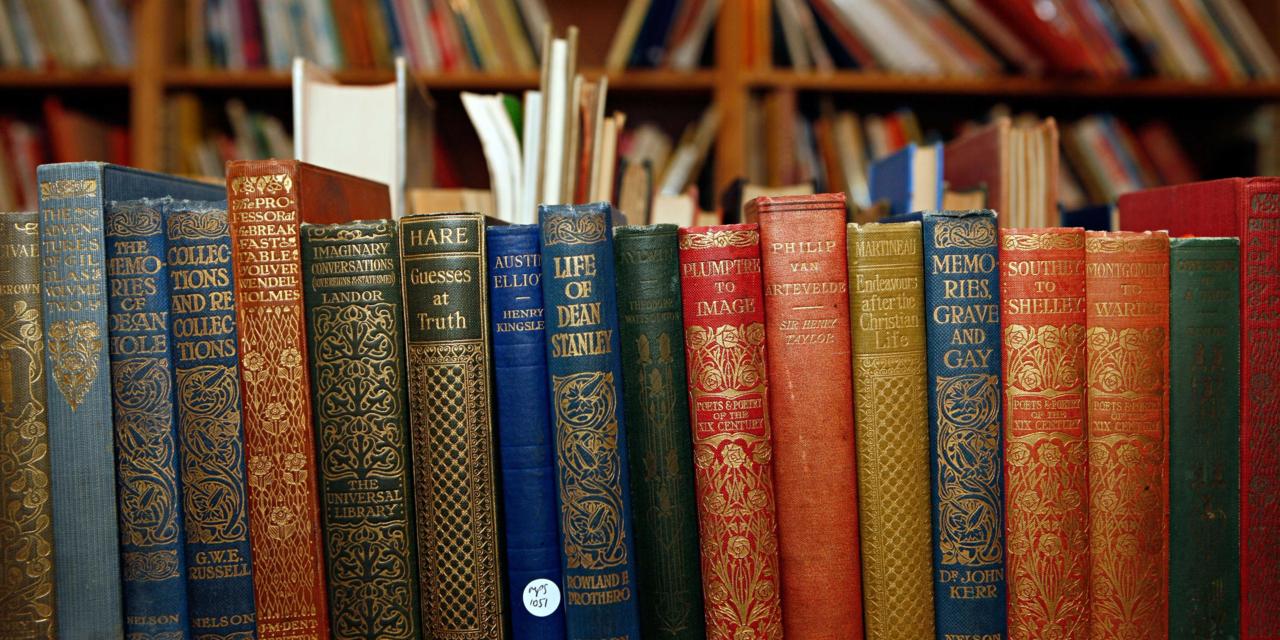 A Stack Of Books In The Library