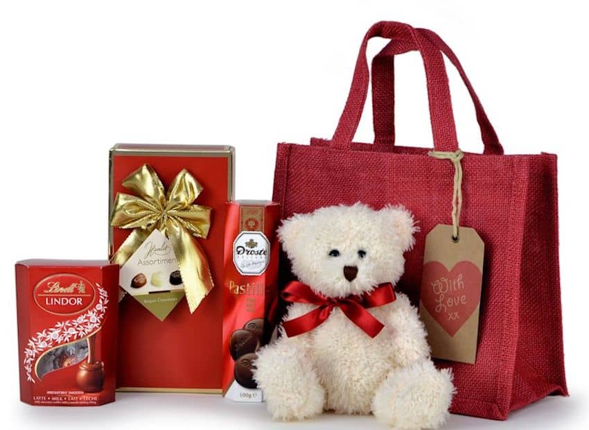 a teddy bear and some other gifts