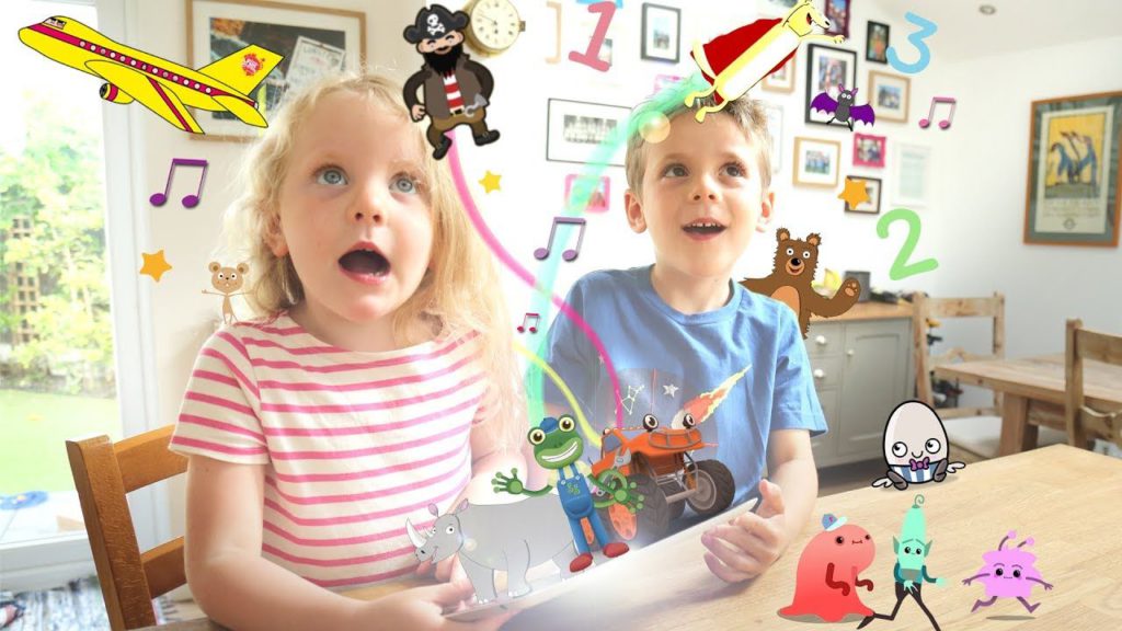 two kids having fun while learning with cartoons