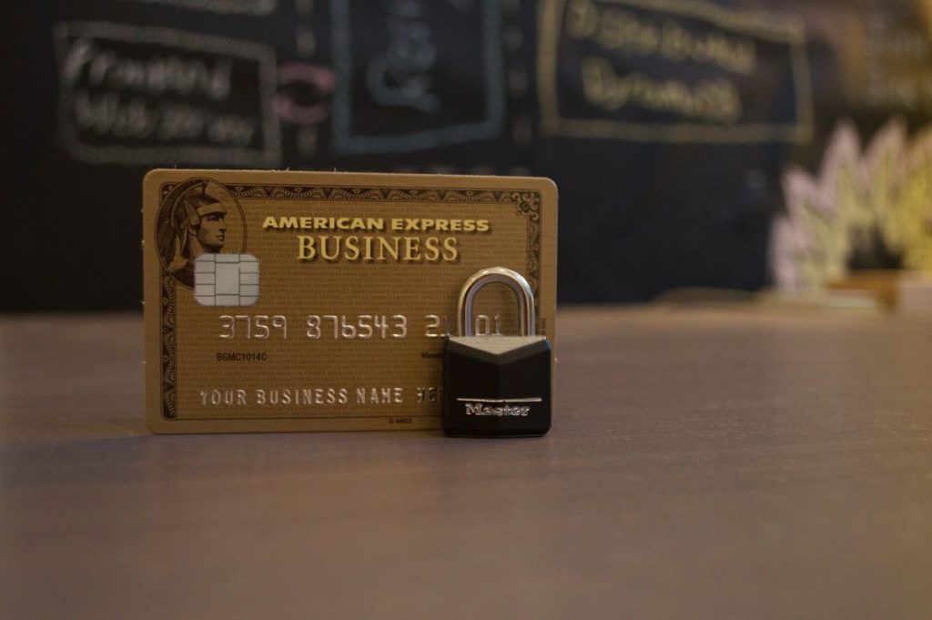 American Express Business Credit Card with a small lock on a table